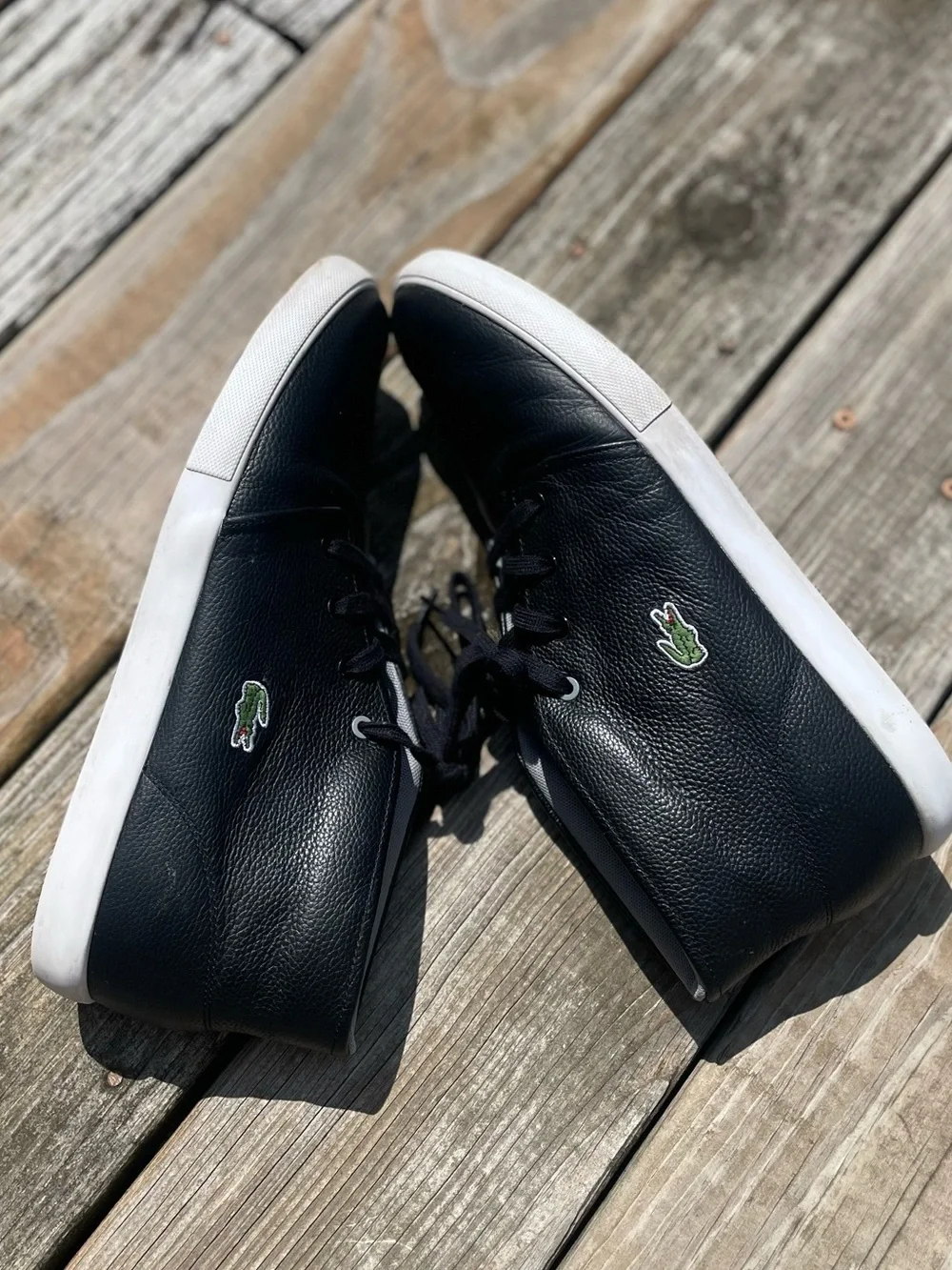 Lacoste Men's Black Leather Slip-On Style Sneakers with White Sole